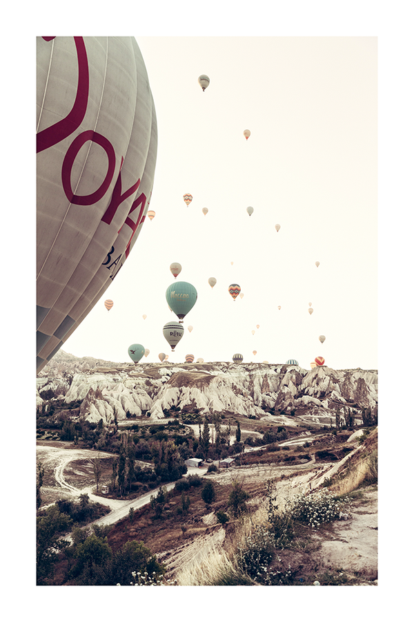 Hot Air Balloons Above Hill Poster